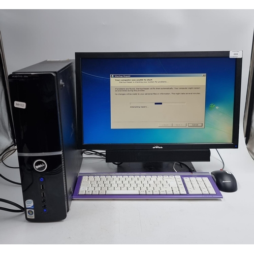 718 - A Dell desktop computer with peripherals