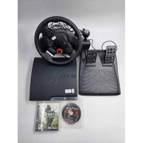 724 - A Sony PlayStation 3 console with Logitech Driving force steering wheel and CALL OF DUTY: 4 MODERN W... 