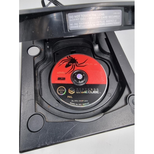 726 - A Nintendo GameCube console with Spider-Man 2 game disc, power adaptor and controller