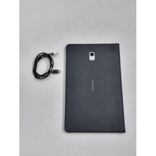 742 - A Samsung Galaxy Tab A SM-T590 (2018) with charging cable and official Samsung flip case