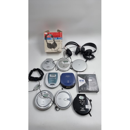 682 - A collection of personal CD players and headphones