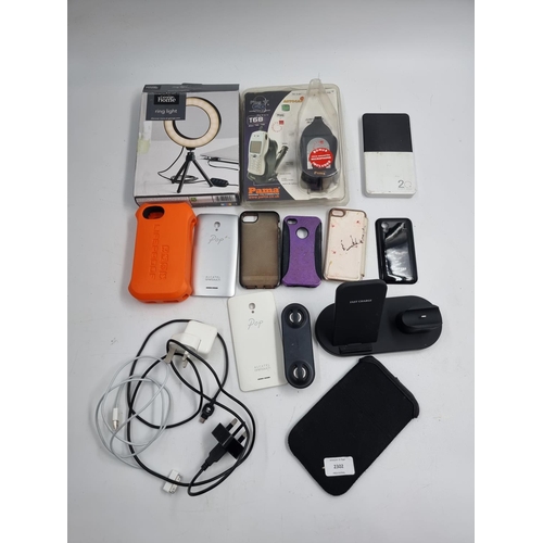 741 - A box containing various mobile phone accessories