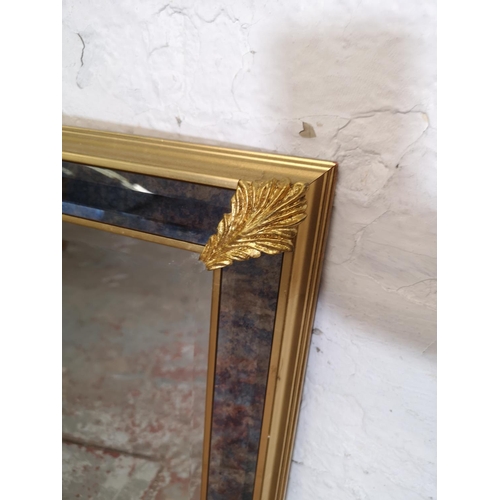 156 - A 19th century style gilt and mottled glass framed bevelled edge wall mirror - approx. 126cm wide x ... 