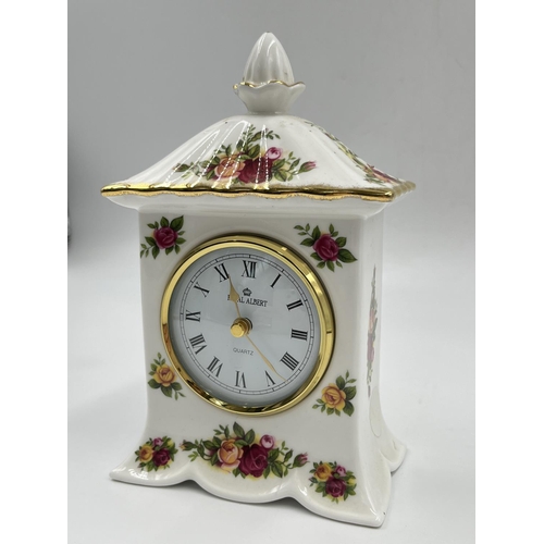 207 - A Royal Albert Old Country Roses quartz mantel clock - approx. 17cm high x 10cm wide x 6.5cm deep