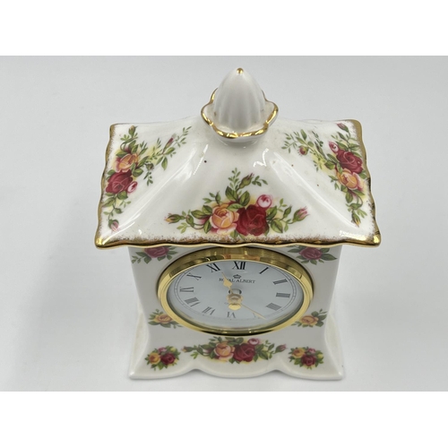 207 - A Royal Albert Old Country Roses quartz mantel clock - approx. 17cm high x 10cm wide x 6.5cm deep