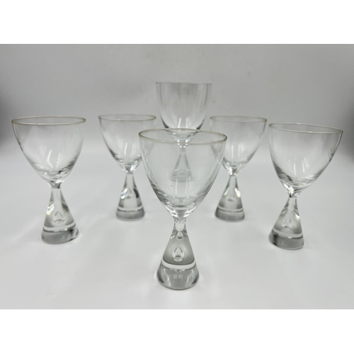 216 - Seven pieces of mid 20th century studio glass, six Swedish Holmegaard teardrop drinking glasses and ... 