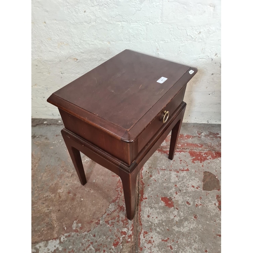 104 - A pair of Stag Minstrel mahogany bedside tables - approx. 56cm high x 44cm wide x 32cm deep