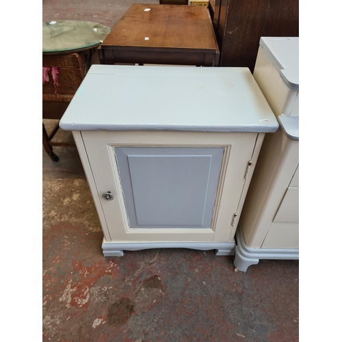 105 - Two pieces of mid 20th century white and pale blue painted furniture, one chest of drawers and one b... 