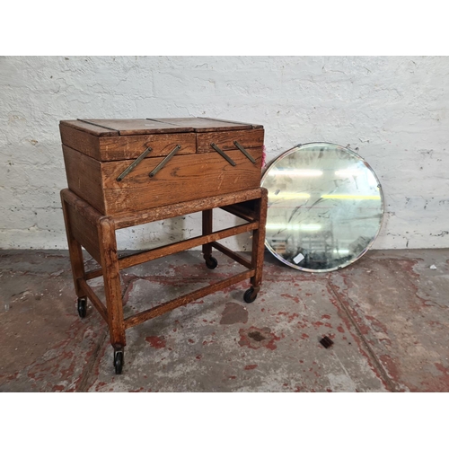 105B - Two items, one Art Deco style frameless bevelled edge circular wall mirror and one mid 20th century ... 