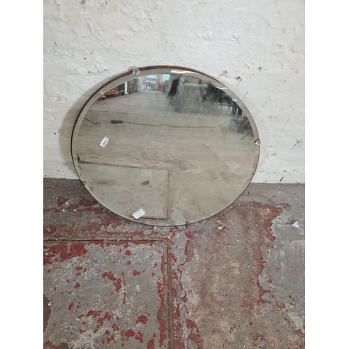 105B - Two items, one Art Deco style frameless bevelled edge circular wall mirror and one mid 20th century ... 