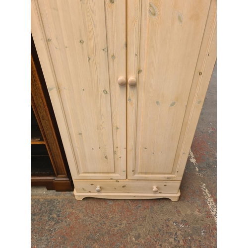 11 - A modern painted pine double wardrobe with lower drawer - approx. 190cm high x 54cm wide x 52cm deep