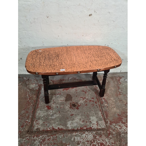 111 - A beech and copper topped coffee table