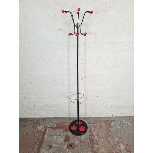 117 - A 1960s Hago black metal and red plastic atomic coat stand - approx. 170cm high