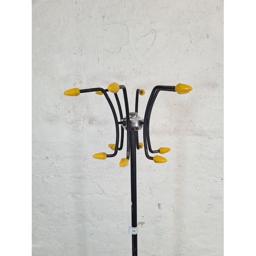 118 - A 1960s Hago black metal and yellow plastic atomic coat stand - approx. 161cm high