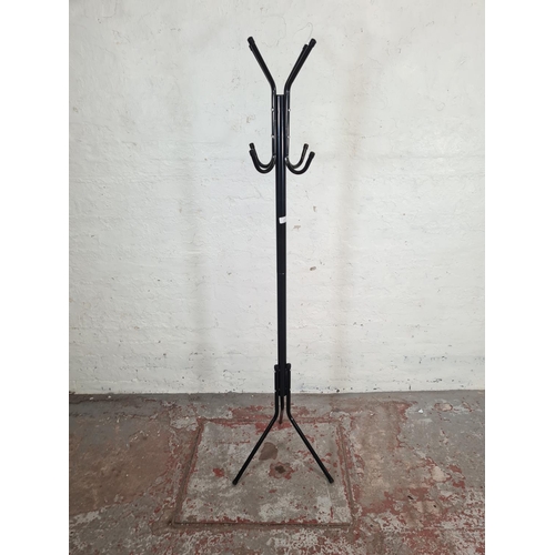 119 - A mid 20th century style black metal coat stand - approx. 172cm high