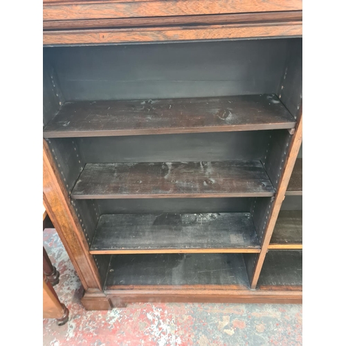 12 - A 19th century rosewood inverted breakfront open bookcase - approx. 145cm high x 185cm wide x 37cm d... 