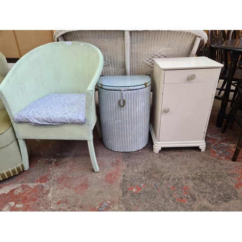 123 - Four pieces of furniture, one mid 20th century white painted bedside cabinet, one Lloyd Loom Lusty w... 