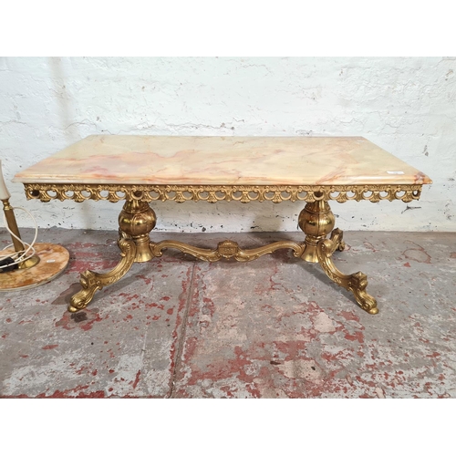 126 - Two pieces of onyx and gilt metal furniture, one rectangular coffee table and one standard lamp - ap... 