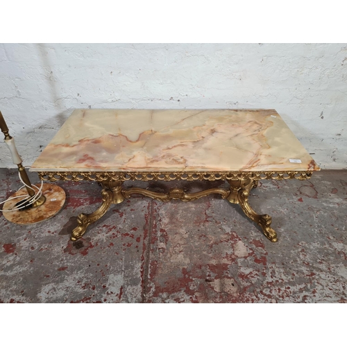 126 - Two pieces of onyx and gilt metal furniture, one rectangular coffee table and one standard lamp - ap... 