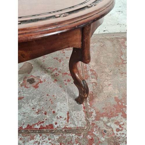 136A - An Anglo Indian style carved mahogany circular side table - approx. 41cm high x 69cm diameter