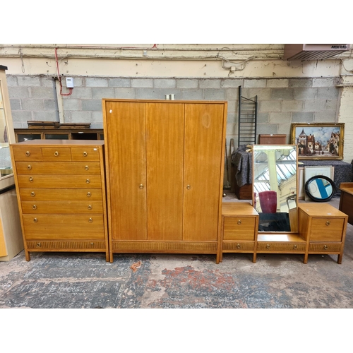 137 - A 1960s Loughborough for Heals teak and brass inlaid three piece bedroom suite comprising chest of d... 