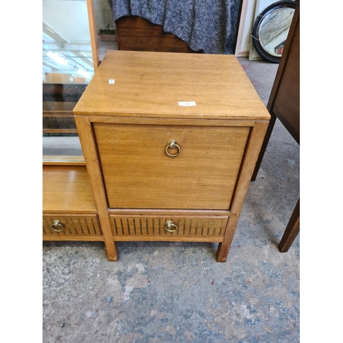 137 - A 1960s Loughborough for Heals teak and brass inlaid three piece bedroom suite comprising chest of d... 