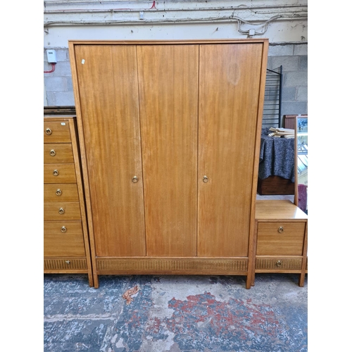 137 - A 1960s Loughborough for Heals teak and brass inlaid three piece bedroom suite comprising chest of d... 