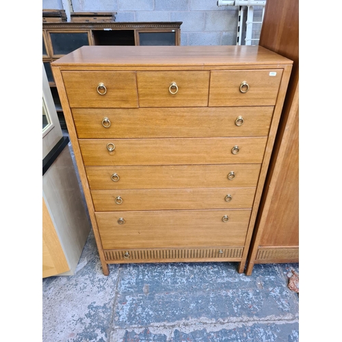 137 - A 1960s Loughborough for Heals teak and brass inlaid three piece bedroom suite comprising chest of d... 