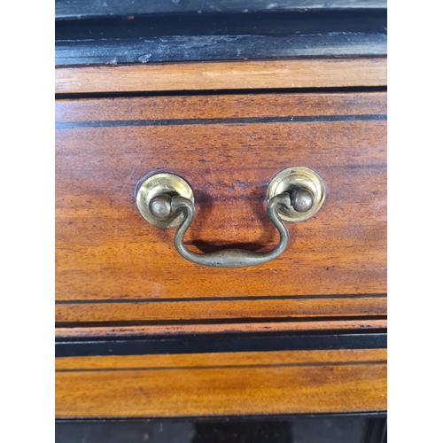 16 - A 19th century ebony inlaid mahogany two door glazed bookcase with three internal shelves and upper ... 