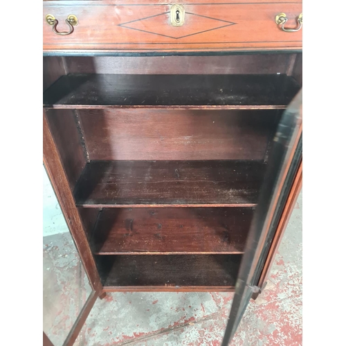 16 - A 19th century ebony inlaid mahogany two door glazed bookcase with three internal shelves and upper ... 