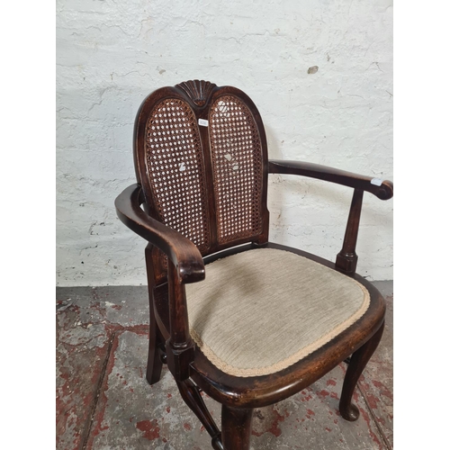 18 - A mid 20th century beech and rattan bergere armchair - approx. 77cm high x 53cm wide x 41cm deep