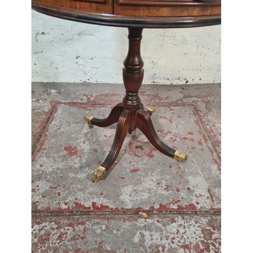 20 - A Regency style mahogany and green leather drum table - approx. 61cm high x 50cm diameter