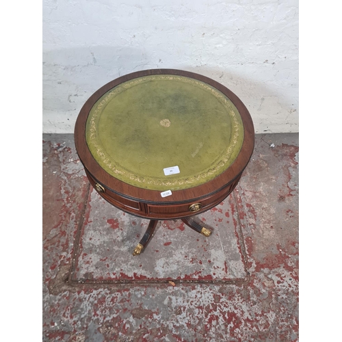 20 - A Regency style mahogany and green leather drum table - approx. 61cm high x 50cm diameter