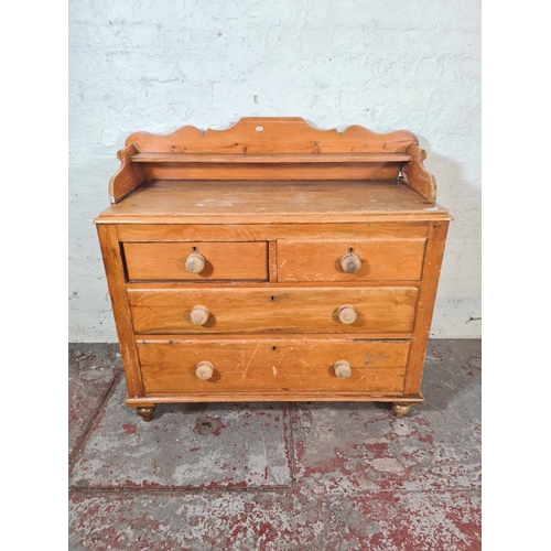 31 - A Victorian pine chest of two short over two long drawers with gallery back - approx. 102cm high x 1... 