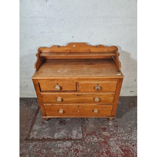 31 - A Victorian pine chest of two short over two long drawers with gallery back - approx. 102cm high x 1... 