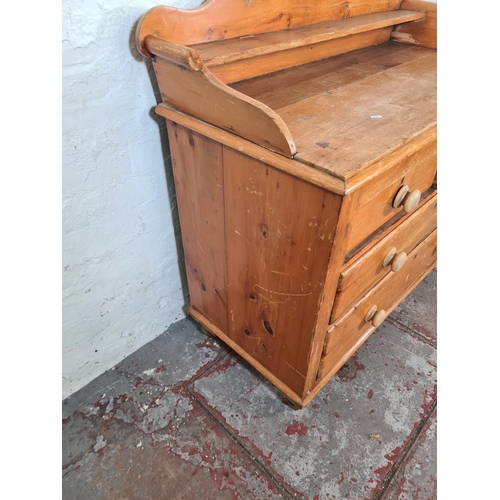 31 - A Victorian pine chest of two short over two long drawers with gallery back - approx. 102cm high x 1... 