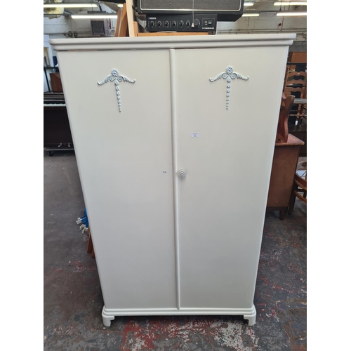 32 - A mid 20th century white and pale blue painted double wardrobe - approx. 170cm high x 101m wide x 59... 