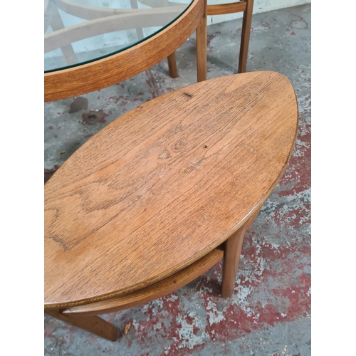 37 - A Nathan teak and glass Trinity coffee table with three nesting tables - approx. 51cm high x 82cm di... 