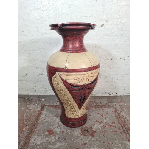 47 - A modern painted terracotta floor vase - approx. 77cm high