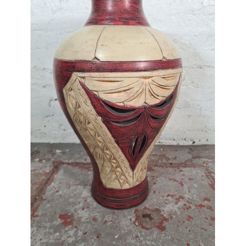 47 - A modern painted terracotta floor vase - approx. 77cm high