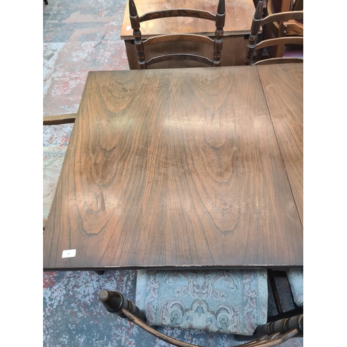 48 - A Younger Toledo chestnut rectangular extending dining table and six matching chairs - approx. 74cm ... 