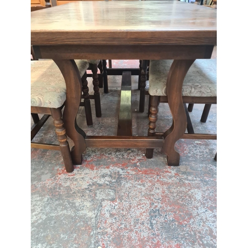 48 - A Younger Toledo chestnut rectangular extending dining table and six matching chairs - approx. 74cm ... 