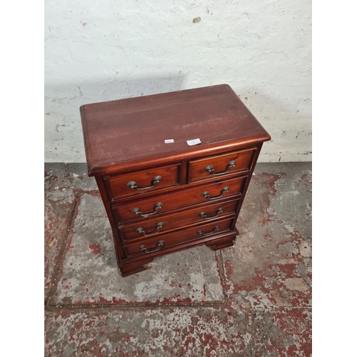 53 - An Ancient Mariner mahogany miniature chest of two short over three long drawers - approx. 68cm high... 