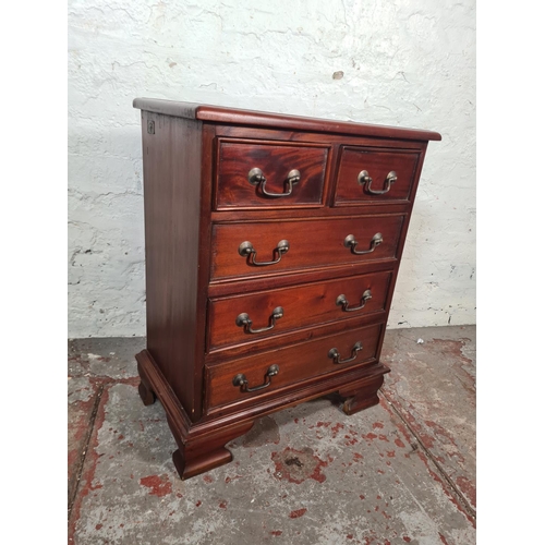 54 - An Ancient Mariner mahogany miniature chest of two short over three long drawers - approx. 68cm high... 