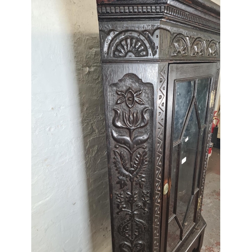 58 - A Victorian Jacobean revival heavily carved oak corner display cabinet - approx. 171cm high x 82cm w... 