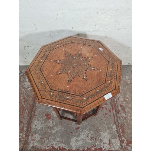 6 - A late 19th/early 20th century Moorish inlaid mahogany octagonal side table - approx. 53cm high x 50... 