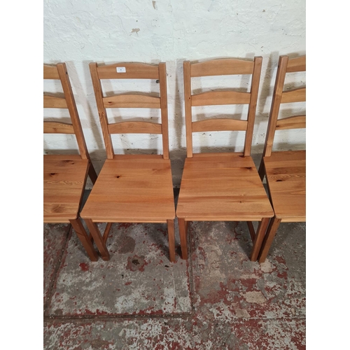 83 - A set of four IKEA Jokkmokk pine dining chairs