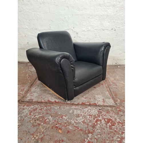 88 - A modern black leatherette child's rocking armchair - approx. 45cm high x 64cm wide x 46cm deep