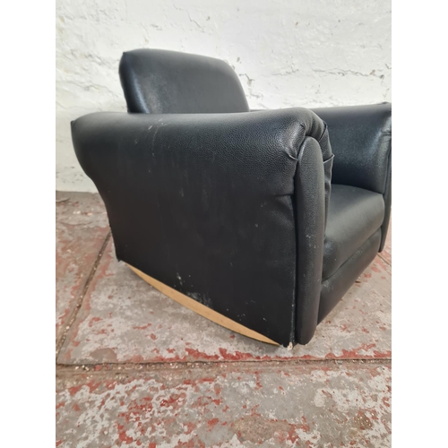 88 - A modern black leatherette child's rocking armchair - approx. 45cm high x 64cm wide x 46cm deep