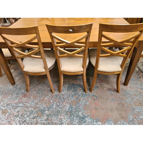 94 - A modern walnut rectangular extending dining table and eight matching chairs - approx. 75.7cm high x... 